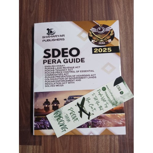 Book titled 'SDEO PERA Guide 2025' by Shaharyar Publishers on a wooden surface.